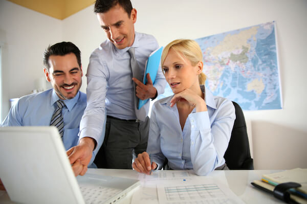 Business people meeting in office with laptop